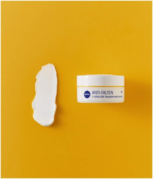 NIVEA Anti-Wrinkle + Revitalizing 55+ Day Cream for Mature Skin – 50 ml – Deeply Nourishing Moisturizer with Argan Oil & Calcium for Firmer, Smoother, Vital-Looking Skin