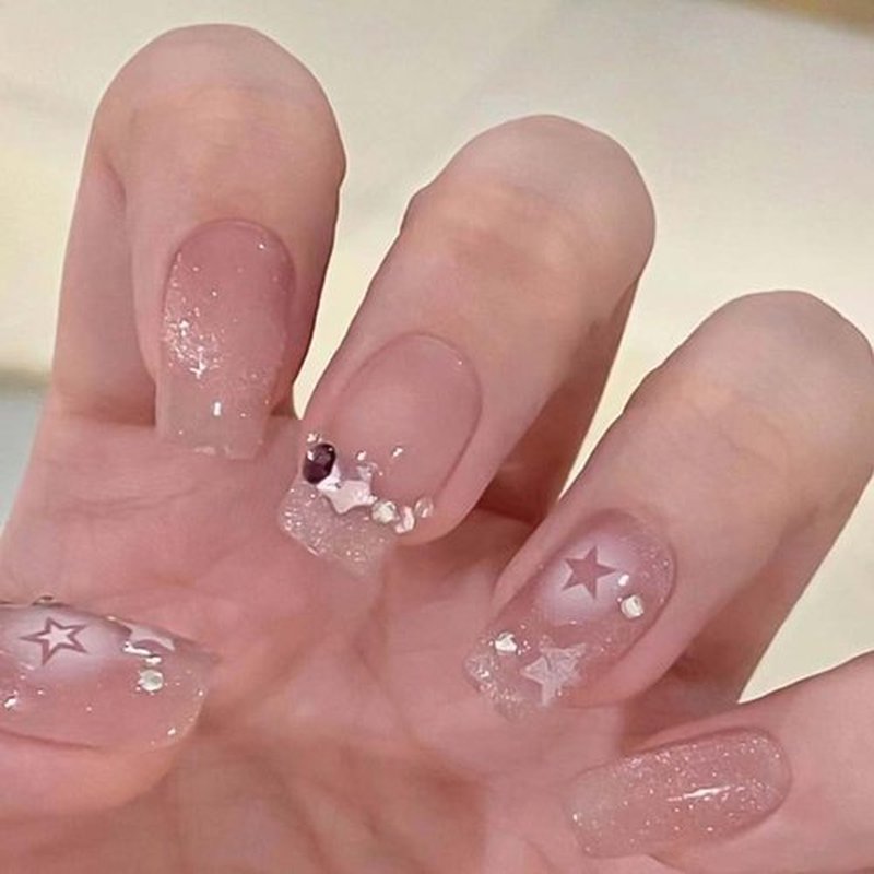 RikView Coffin Press on Nails Medium Fake Nails Nude Nails with Star Rhinestones Glossy Full Cover Nails for Women 24 PCs/Set