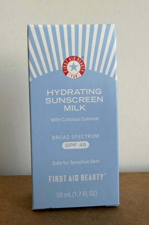 First Aid Beauty - Hydrating Sunscreen Milk with Colloidal Oatmeal, Broad Spectrum SPF 45, Non-comedogenic SPF Formula Helps Nourish Skin with Organic UV Filters & Glycerin, 24-hour Hydration, 1.7 oz