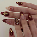 Almond French Tip Gold Glue Press On False Nails with Charms Cross 3D Gems Rhinestones Moon Design Red Acrylic Nails for Women Girls