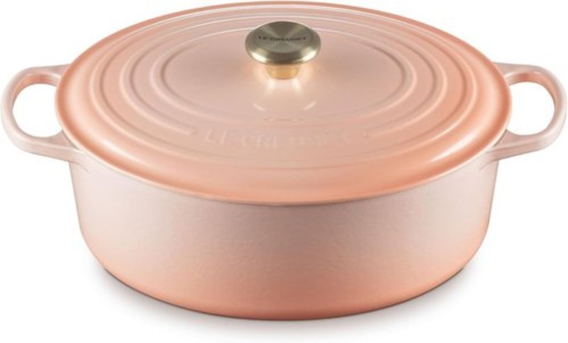 Le Creuset Enameled Cast Iron Dutch Oven - 8 Qt. Signature Oval in Peche with Light Gold Knob