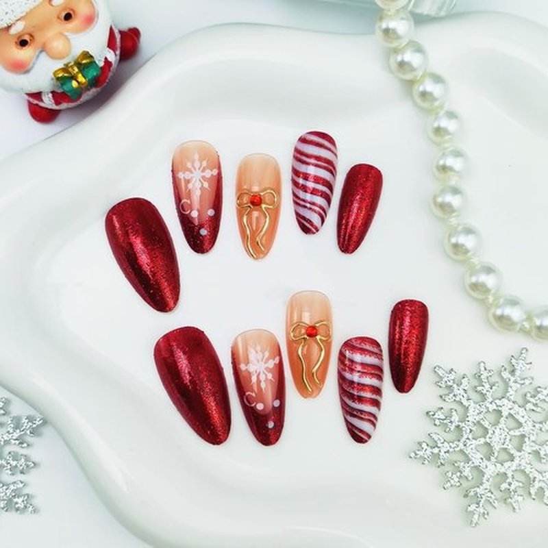 Long Stiletto Press on Nails Red Glitter French Christmas Fake Nails 3D Bow with Rhinestones Design Winter Xmas Acrylic False Nail Snowflake Glue on Nail Candy Stripes Stick on Nails for Women 24Pcs