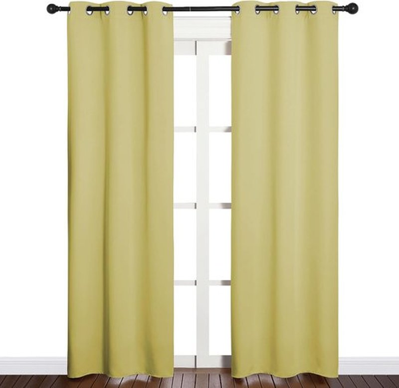 NICETOWN Blackout Curtain Panels - Thermal Insulated Grommet Drapes for Basement | Pale Yellow, 34x84" (1 Pair)