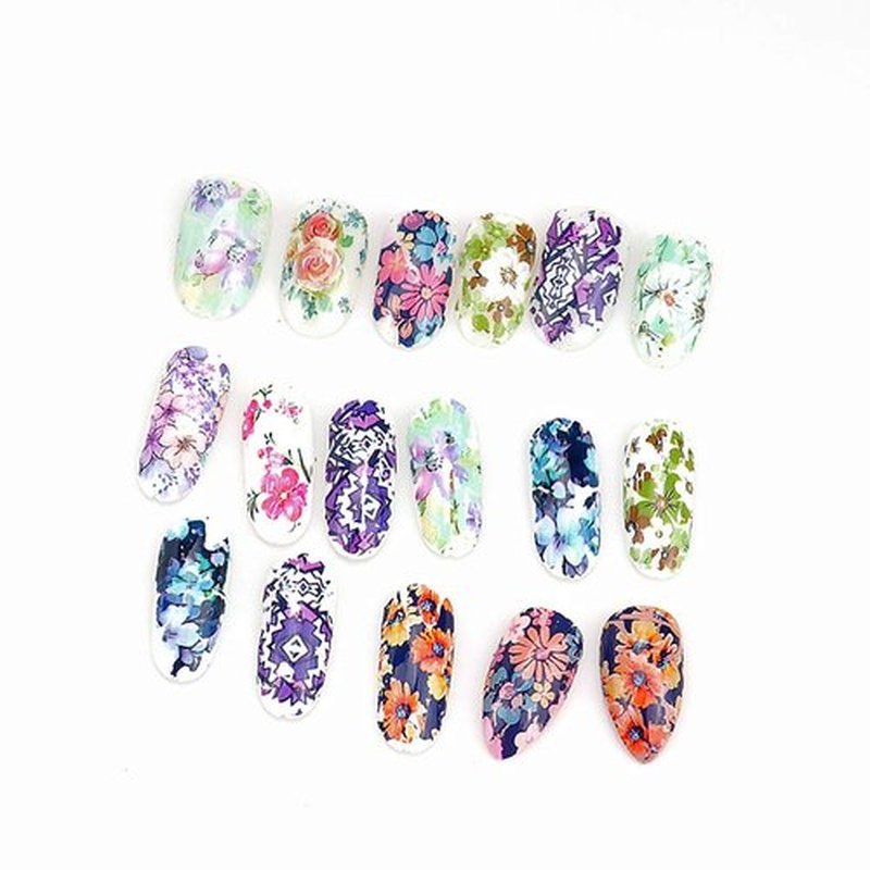 SILPECWEE 50 Sheets Foil Nail Art Transfer Stickers Tips Laser Flower Marbling Solid Color Nail Wraps Decals Starry Sky Star Manicure DIY Tools