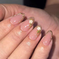 Nude Pink Flower Press On Nails 24PCS – Almond Soft Gel Fake Nails with Gold French Tips, Glossy Reusable False Nails, Elegant Floral Stick On Nails for Women, Salon-Quality Manicure at Home