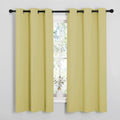 NICETOWN Blackout Window Curtain Panels - Thermal Insulated Draperies for Basement | Pale Yellow, 34x54 Inch (1 Pair)