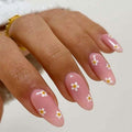 RikView Pink Press on Nails Medium Fake Nails with Daisy Design Almond Nails Glossy Full Cover Nails for Women 24 PCs/Set