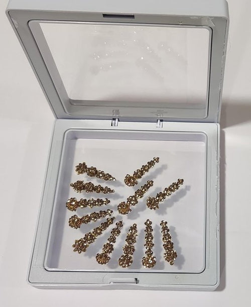 12 Bindi Box Long Crystal Bindis Bridal face Jewels Forehead Tika (With Extra Crystal Stones) | wedding makeup party event body art temporary tattoo Indian Bindi for women (Golden)