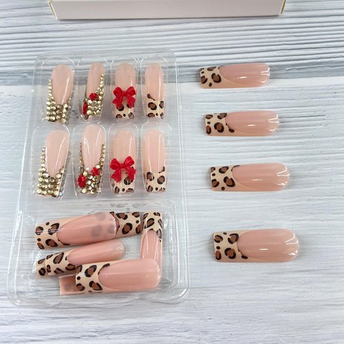 Gold Bling Rhinestones Press on Nails Long Square Fake Nail Leopard Print French Tip False Nails with Red Bow Charms Designs Full Cover Artificial Stick on Nail Acrylic Glue on Nail for Women 24 Pcs