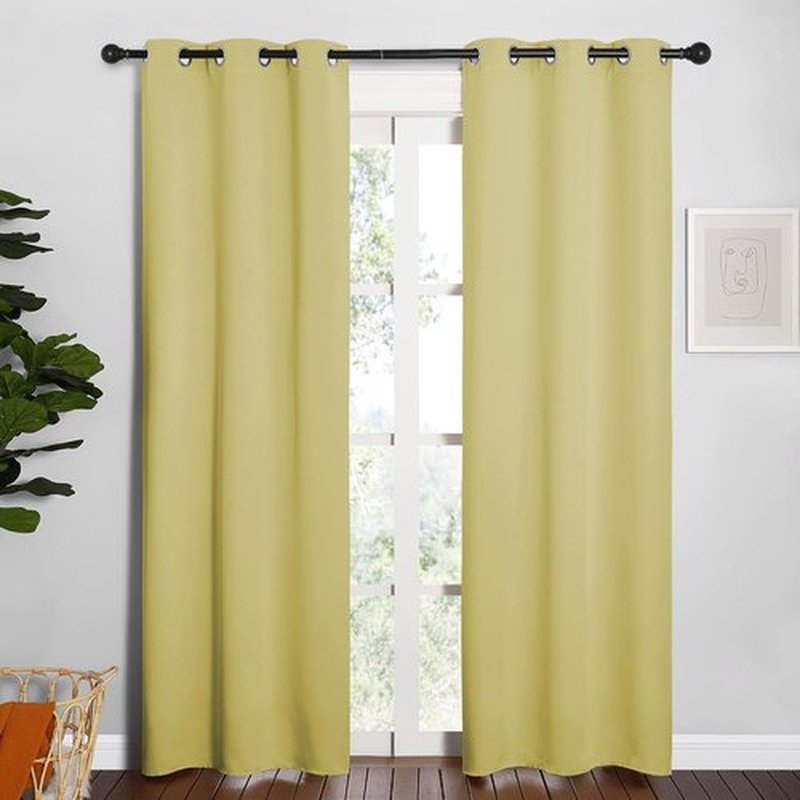 NICETOWN Blackout Curtain Panels - Thermal Insulated Grommet Drapes for Basement | Pale Yellow, 34x84" (1 Pair)