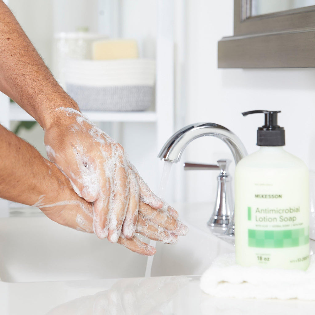 McKesson Antimicrobial Lotion Hand Soap with Aloe, 18 oz Pump Bottle [Pack of 1] - Herbal Scent, Keeps Hands Clean and Moisturized, Medical-Grade Soap