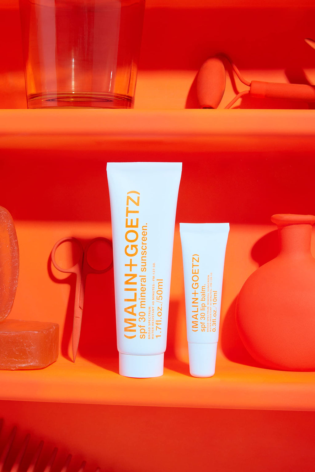 MALIN+GOETZ SPF 30 Lip Balm | Mineral Broad Spectrum Sun Protection with Titanium Dioxide | Moisturizing, Nourishing + Refreshing Spearmint | Reef-Safe, Vegan + Cruelty-Free Lip Care (0.3 Fl Oz.)