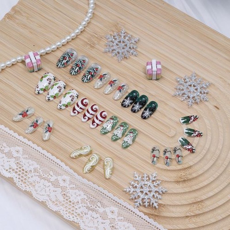 30Pcs Christmas Handmade Press on Nails Medium Almond Christmas Fake Nails Cute Snowman Lights Designs Xmas Acrylic Nail Winter Snowflake Glue on Nails Xmas Tree Holly Leaf False Nails for Women