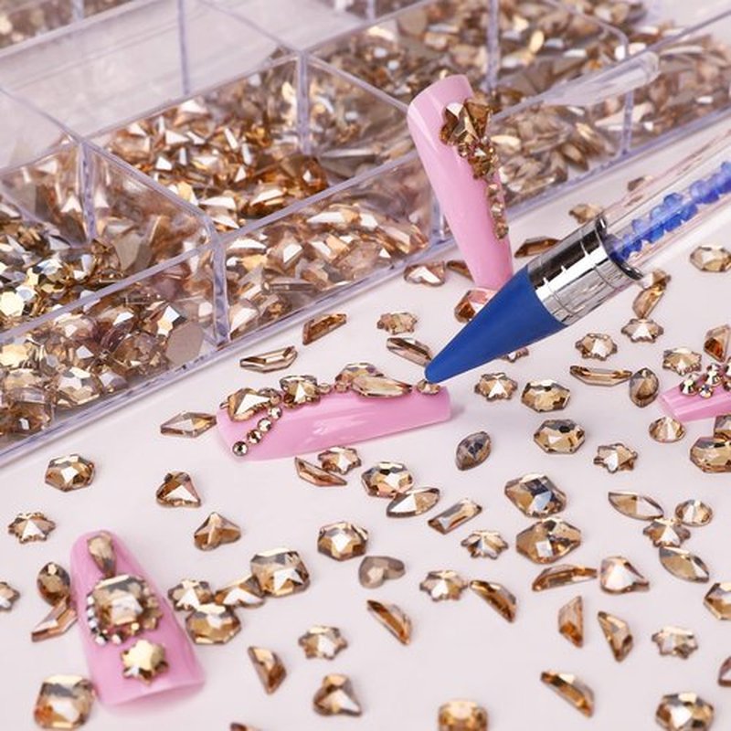 HINABTRU Gold Rhinestones for Nails Champagne Nail Gems Diamonds-7220Pcs Nail Crystals Jewels-Nail Charms Accessories for Nail Decoration(14 Different Shape+ 6520 Round Gold Nail Stones+Wax Pen)