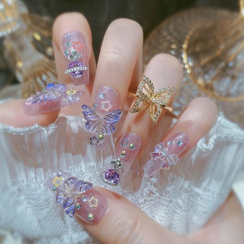 Purple Press on Nails Medium Coffin Fake Nails with Butterfly Bow Rhinestones Star Designs 3D Charm Decoration Handmade Nails Press ons Glitter Acrylic Glue on Nails for Women 24 Pcs
