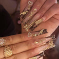 Leopard Brown Press on Nails Long Gold Fake Nails Glossy Bow Cheetah Glue on Nails Heart Coffin Acrylic Nails Spear Zebra False Nails Dollar Money Stick on Nails Rhinestones French Tip Nails for Women