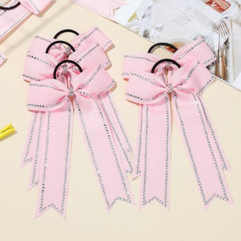 DEEKA Long Tail Rhinestones Cheer Bows 12 PCS Collegiate Style Cheer Bows Full Rhinestone Skinny Cheer Bow Ponytail Holder Handmade Bows for Girls Teens Cheerleader Sports (Light Pink)