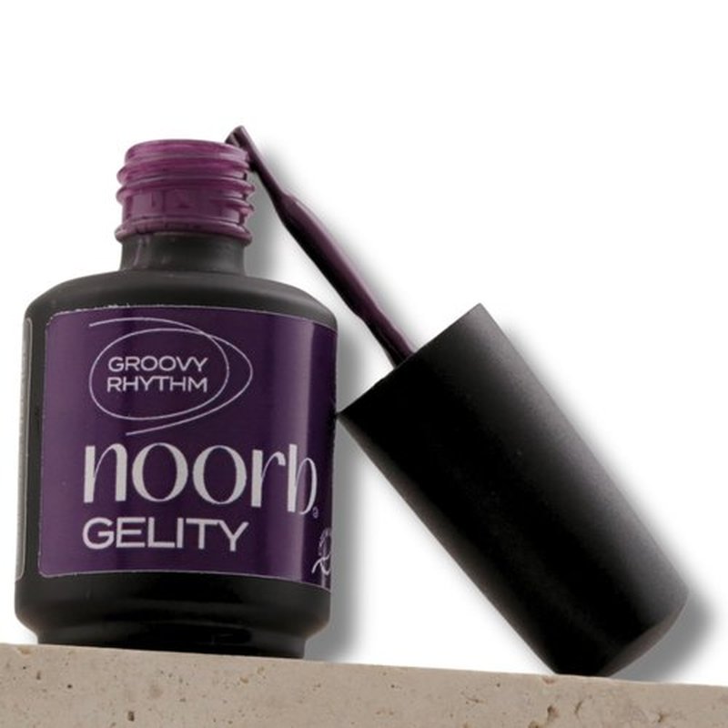 noorb beauty Dark Purple gel nail polish. 90% color coverage from the first layer. Hypoallergenic and Odorless UV lamp gel polish made with natural pigments.