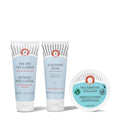 First Aid Beauty - Ultimate Hydration Travel Bundle | Pure Skin Cleanser, Ultra Repair Cream & Radiance Pads (2 oz & 28 Pads)