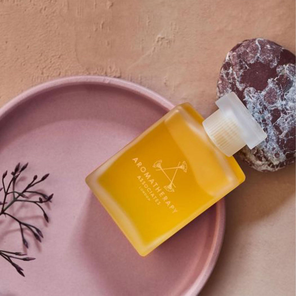 Aromatherapy Associates Inner Strength Bath and Shower Oil, Natural Body Oil to Uplift Mind, Body and Spirit, Made with 3 Essential Oils (1.86 oz)