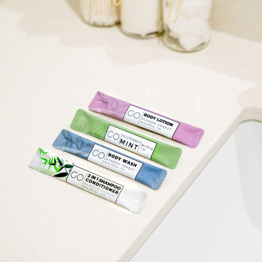 Go Essentials - Bundle Sets (Bamboo Forest and Refreshing Mint, 80 Packets Total (20 of Each)) Travel size mouthwash, shampoo/conditioner, body wash, body lotion.