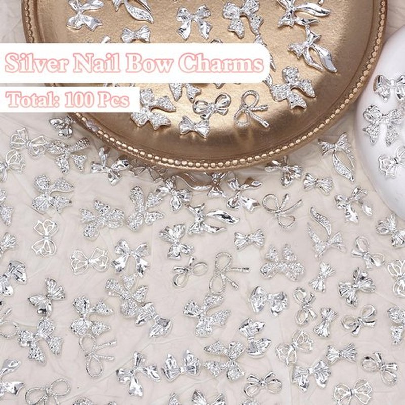100 Pcs Silver Bow Nail Charms Y2K, 10 Styles Alloy Nail Bows Charms for Nail Art, Shiny Metal Bowknot Nail Art Charms for Nails Art Design DIY Accessories