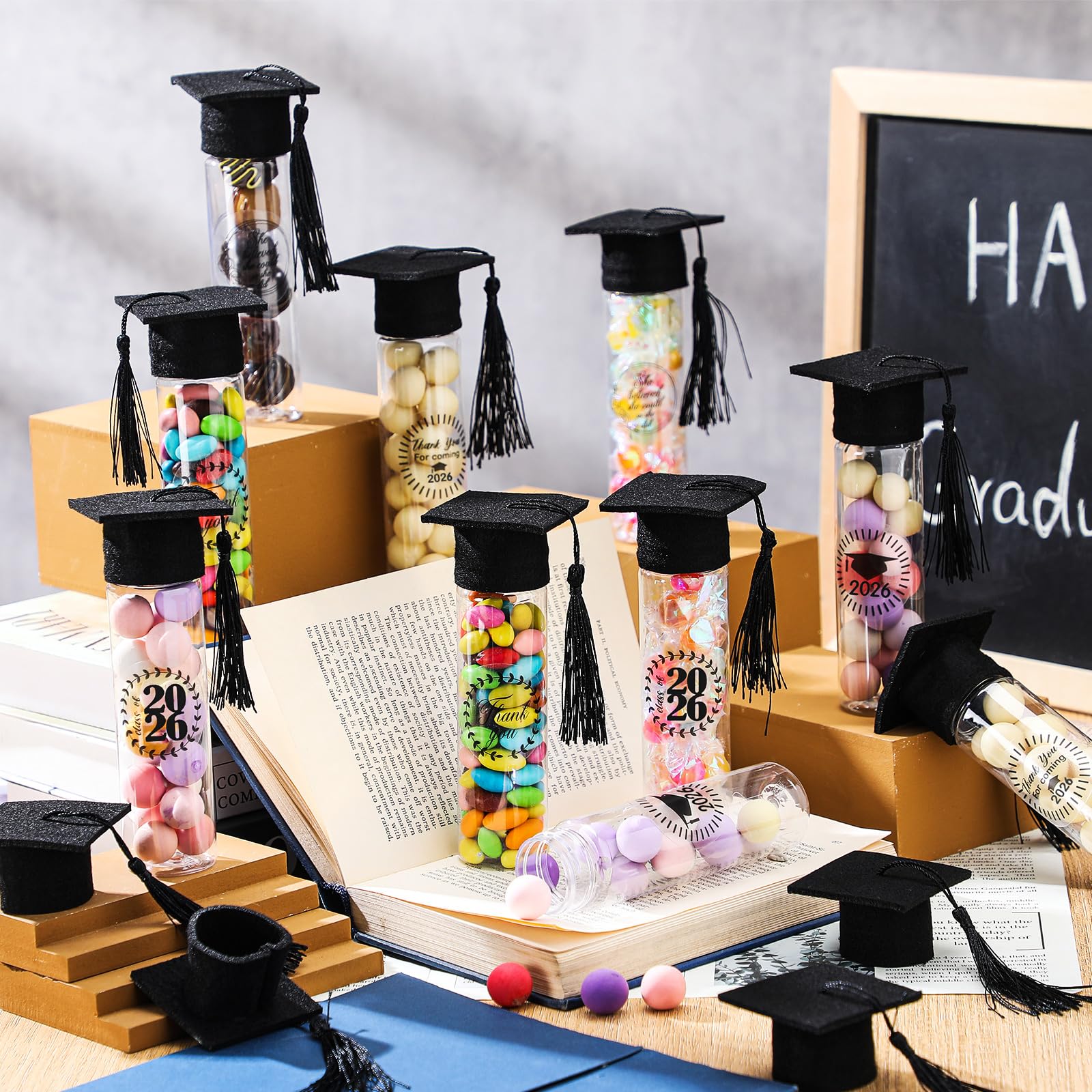 Teenyyou 25 Pcs Graduation Candy Tubes 2026 Graduation Party Favors Candy Boxes Plastic Grad Cap Jars Container with Tassels and Stickers for DIY Grad Table Party Favors (Black)