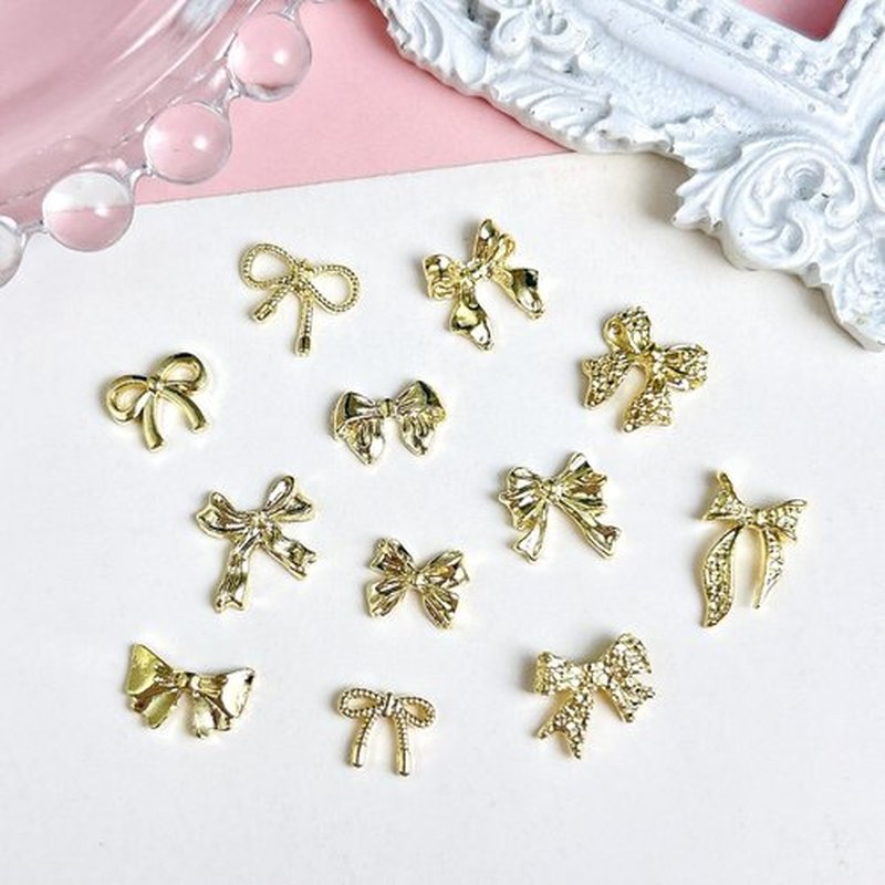 LERBOU 120Pcs Gold Bow Nail Charms, 3D Metal Alloy Bowknot Nail Art Golden Bows Charms for Nails Decor Accessories DIY Craft