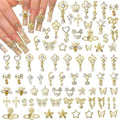 50 Pcs Gold Nail Charms, Gold Dangle Star Heart Bows Nail Charms and Gems Metal Bees Butterfly Crown Planet Cross Dollar Sign Golden Nails Art Supplies for Women DIY Accessories