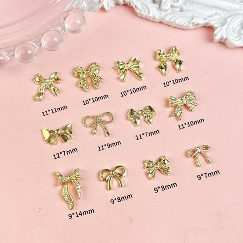 LERBOU 120Pcs Gold Bow Nail Charms, 3D Metal Alloy Bowknot Nail Art Golden Bows Charms for Nails Decor Accessories DIY Craft